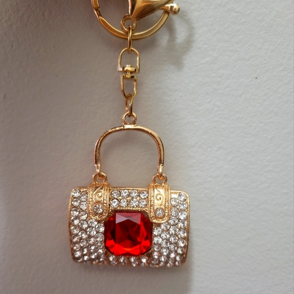 Accessories - Bag or key charm- cute gold purse with red gem. NWOT.